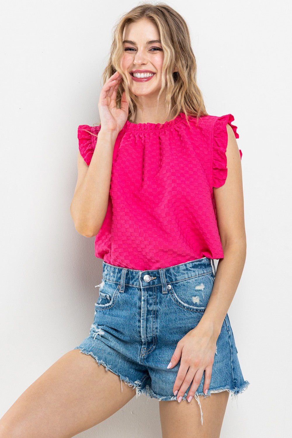 Textured Ruffle Sleeveless Blouse