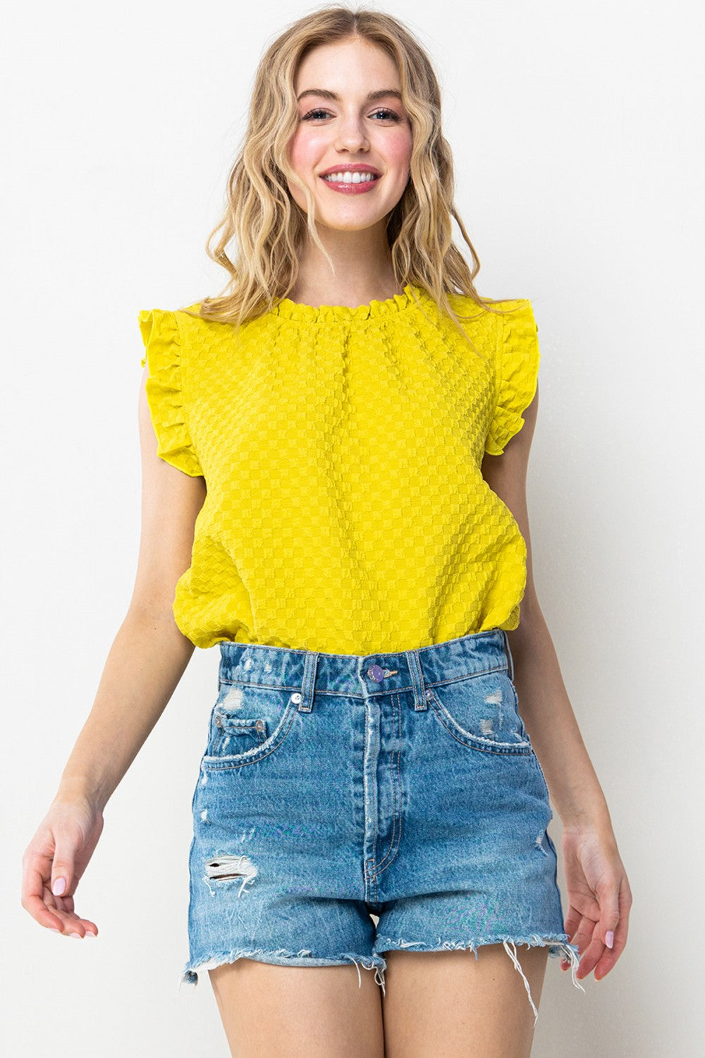 Textured Ruffle Sleeveless Blouse