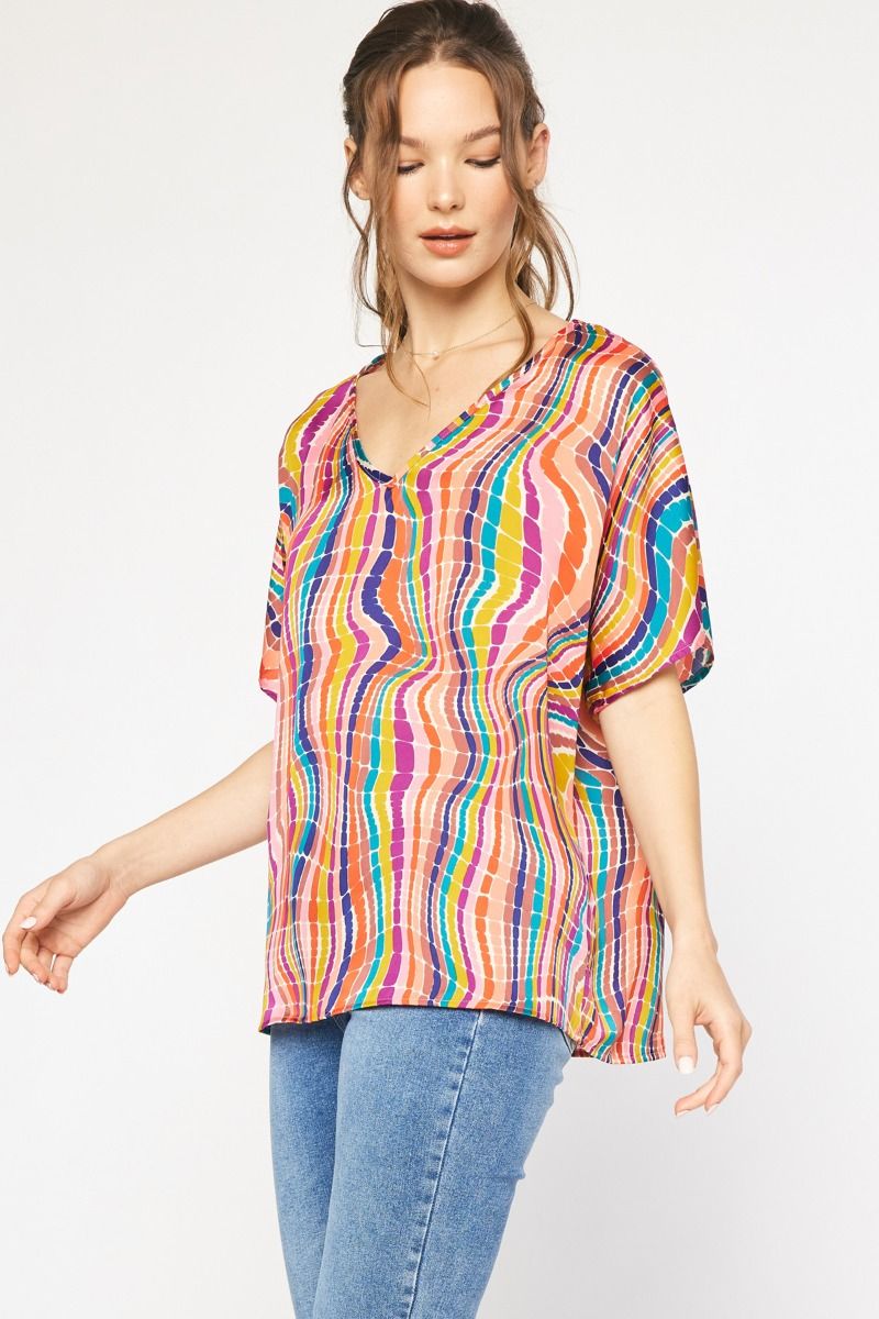 The McMann Kat Swirl V Neck Top