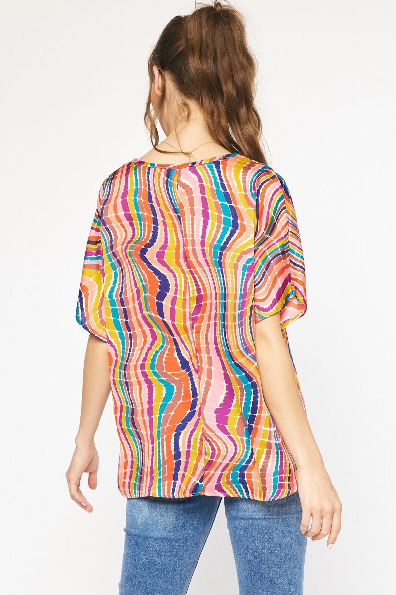 The McMann Kat Swirl V Neck Top