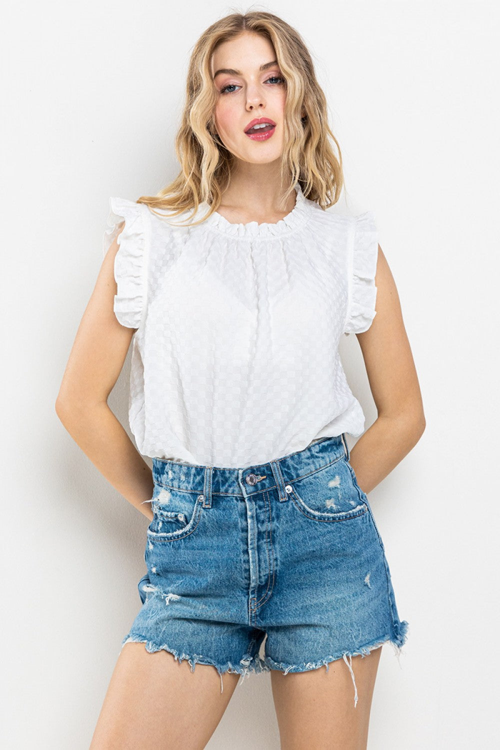 Textured Ruffle Sleeveless Blouse